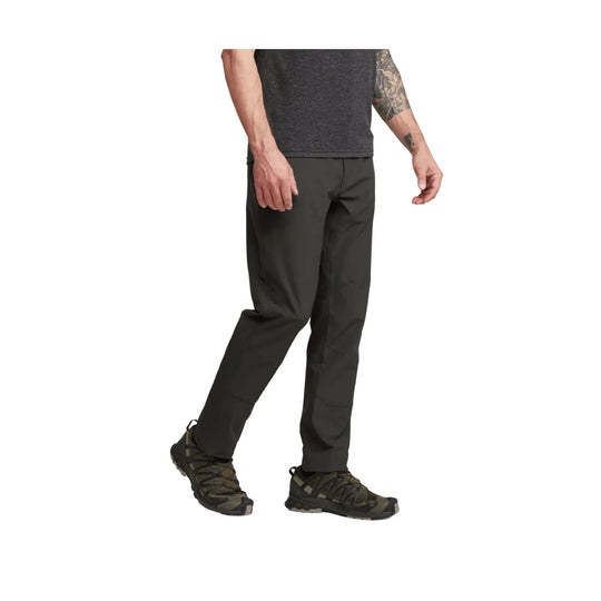 Black men's hiking pants with tapered legs and articulated knees, shown with trail shoes