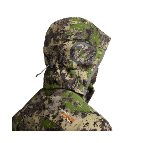 Camouflage hooded jacket with integrated face mask and side ventilation panel