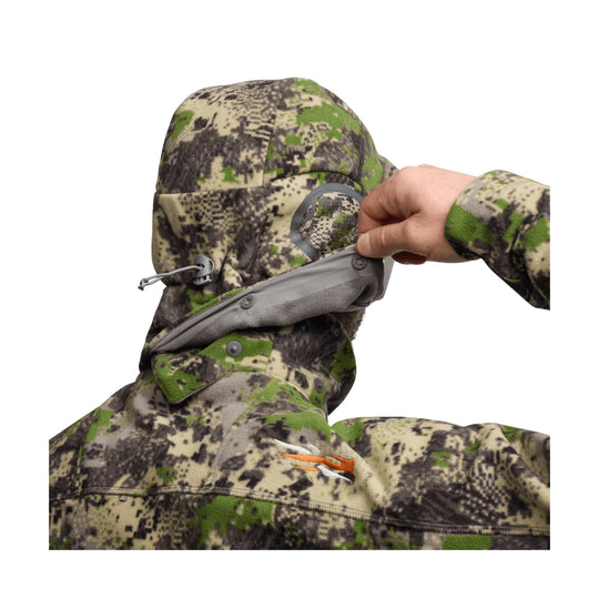 Camo hooded jacket with built-in face mask and chest logo, shown from the back