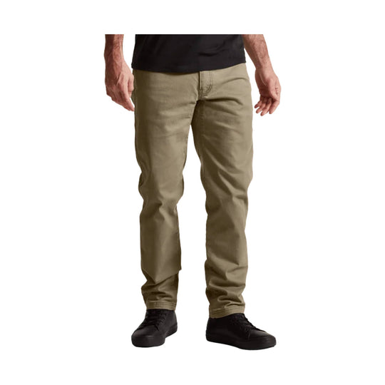 Khaki straight-leg pants on a model with black sneakers