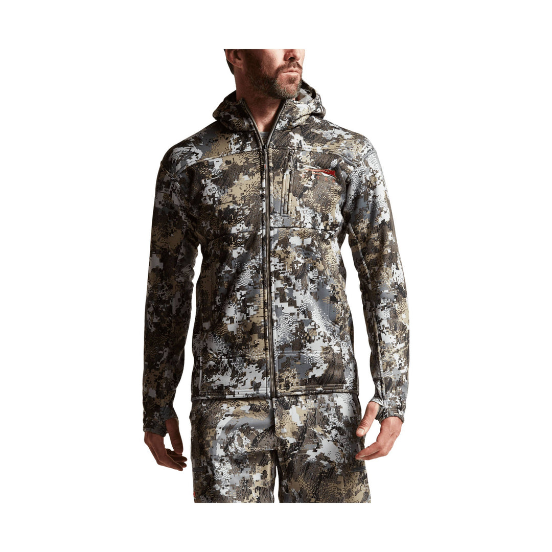 Camouflage hooded zip-up jacket with chest and sleeve pockets, shown on a model