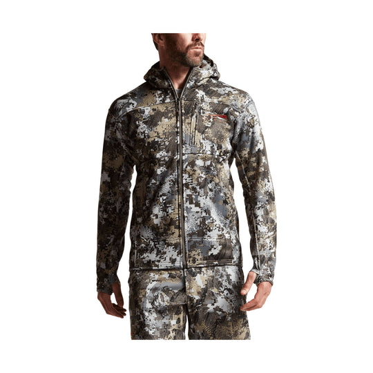Camouflage hooded zip-up jacket with chest and sleeve pockets, shown on a model