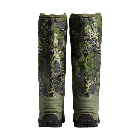 Camouflage knee-high boots with olive green lower shells and black soles, shown from the back