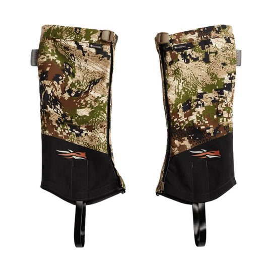 Camouflage knee-high gaiters with black lower panels, pull tabs, and side zippers