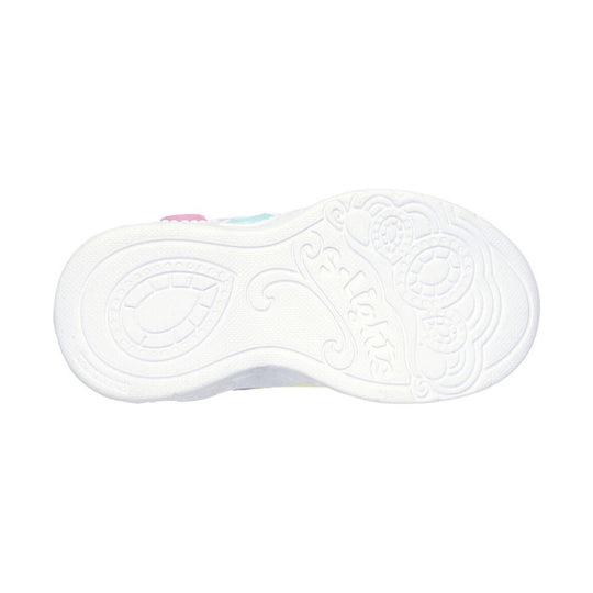 White toddler sneaker sole with embossed princess-style swirls and small pastel pink and blue accents at the edge