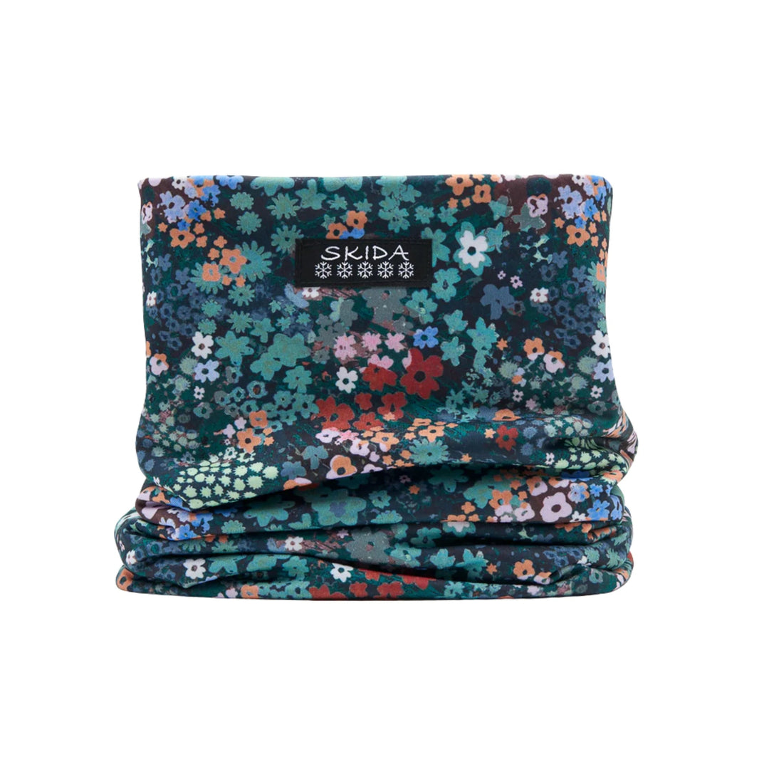 Floral patterned fleece neck warmer with a SKIDA label
