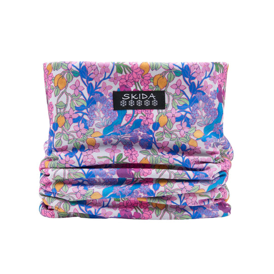 Floral-patterned fleece neck warmer with a black SKIDA label