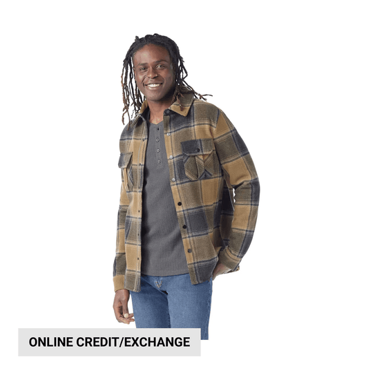 Plaid shirt jacket worn over a gray henley, with online credit/exchange text