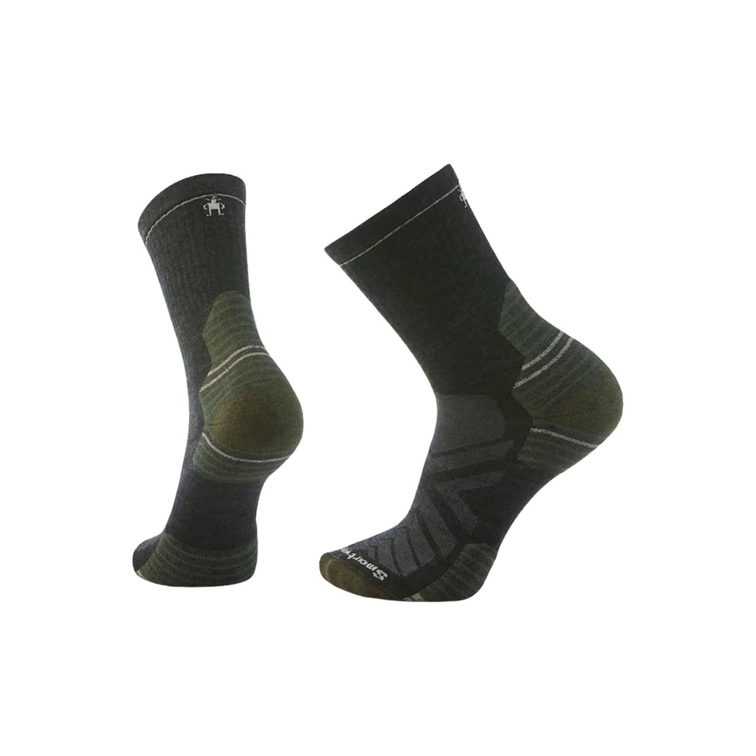 Black crew hiking socks with dark green heel and toe cushioning and small logo marks near the cuff and toe.