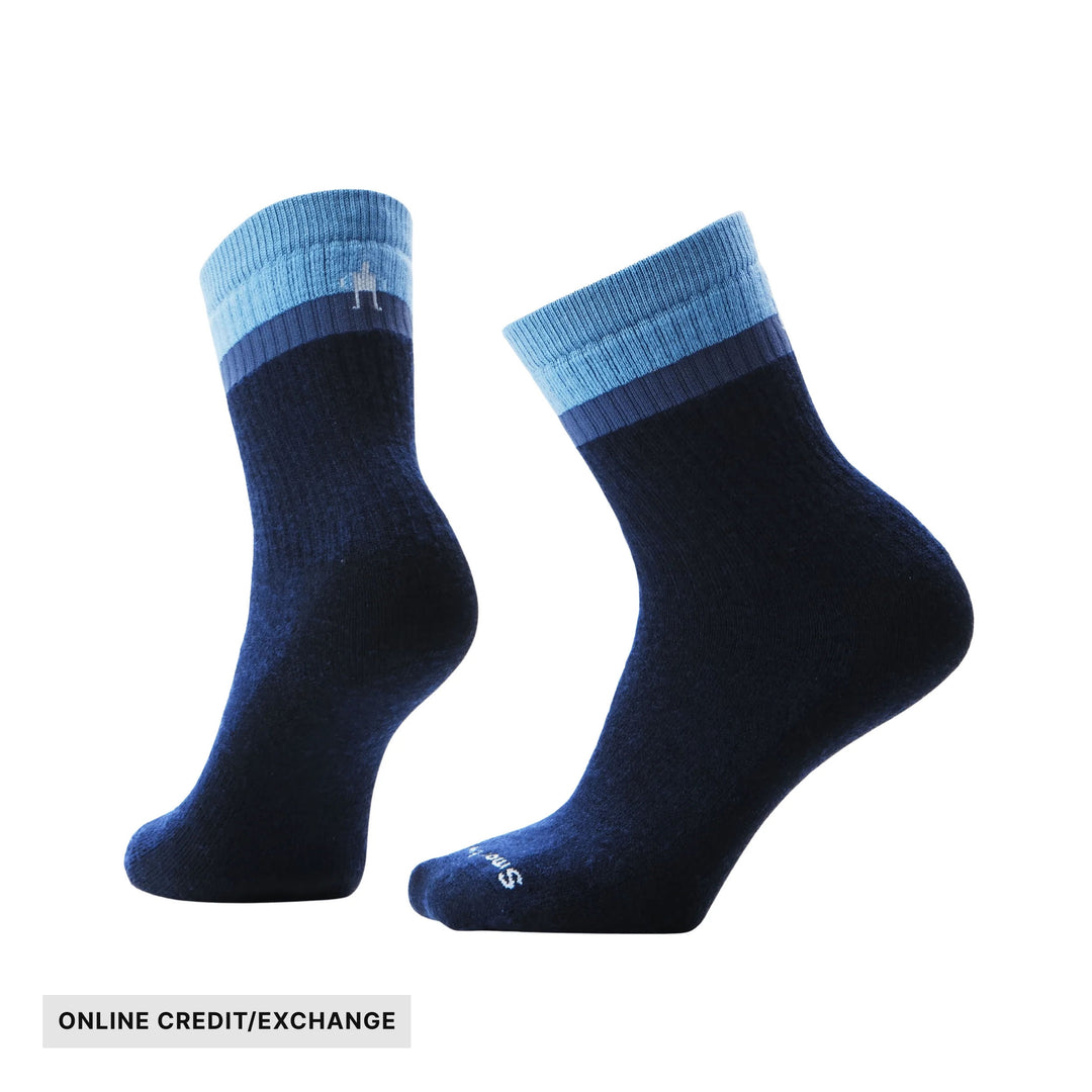 Pair of navy crew socks with light blue and dark blue striped cuffs