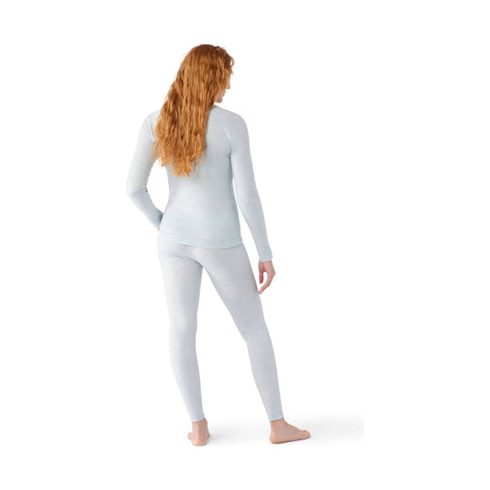 Light blue long-sleeve thermal base layer top and leggings shown from the back