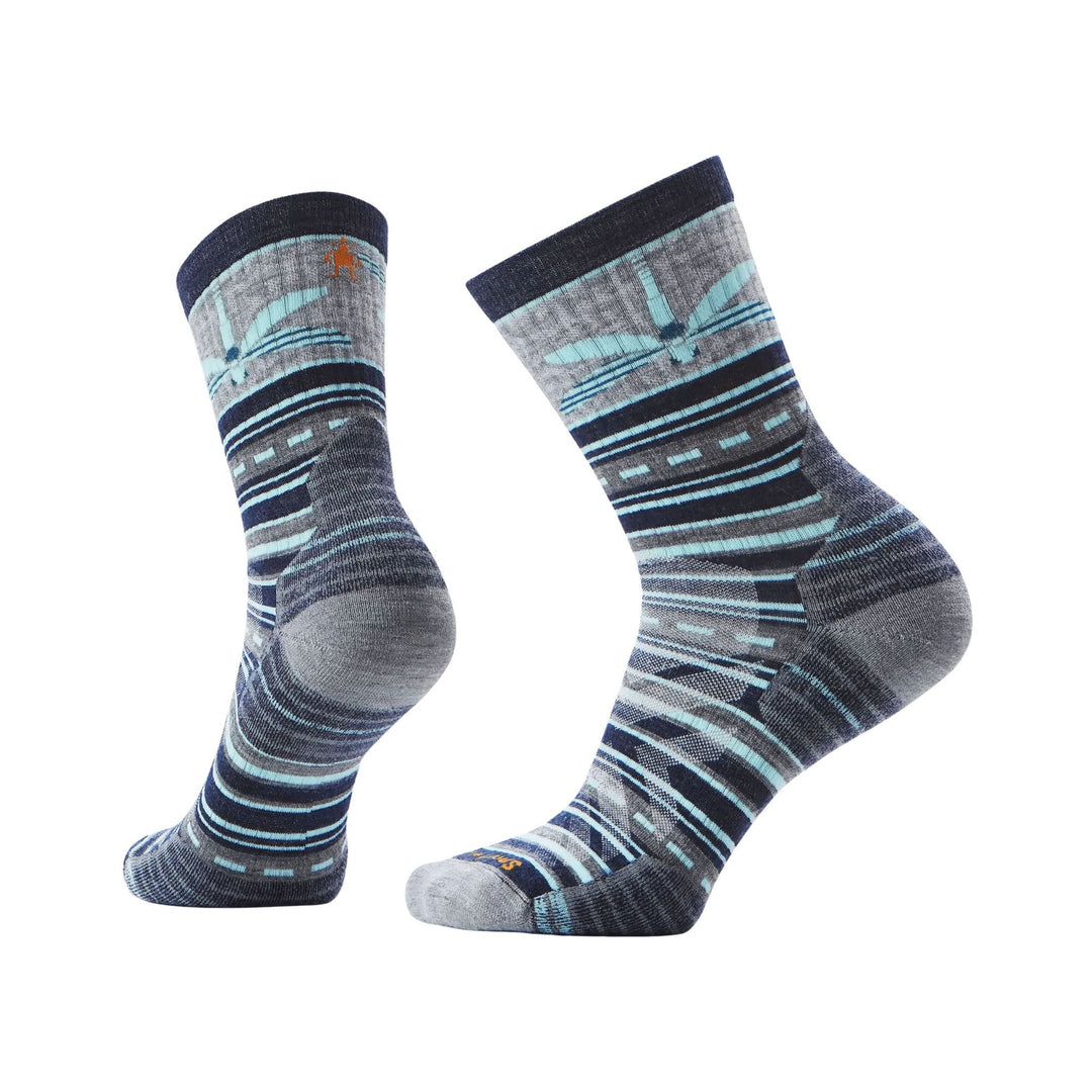 Pair of patterned mid-crew hiking socks in navy, gray, and light blue with cushioned heels and toes