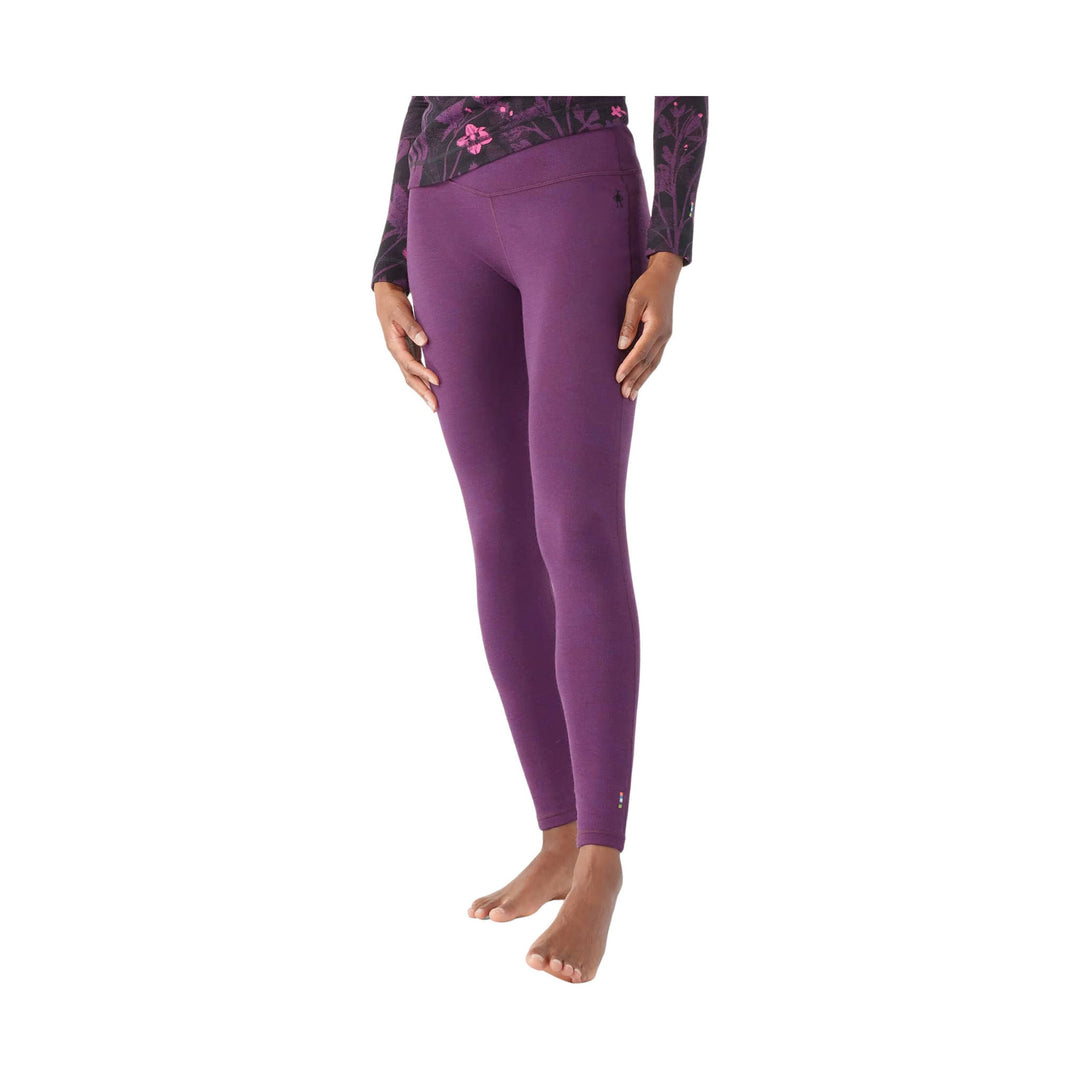 Purple women’s thermal leggings with a high waistband and floral print on the upper layer