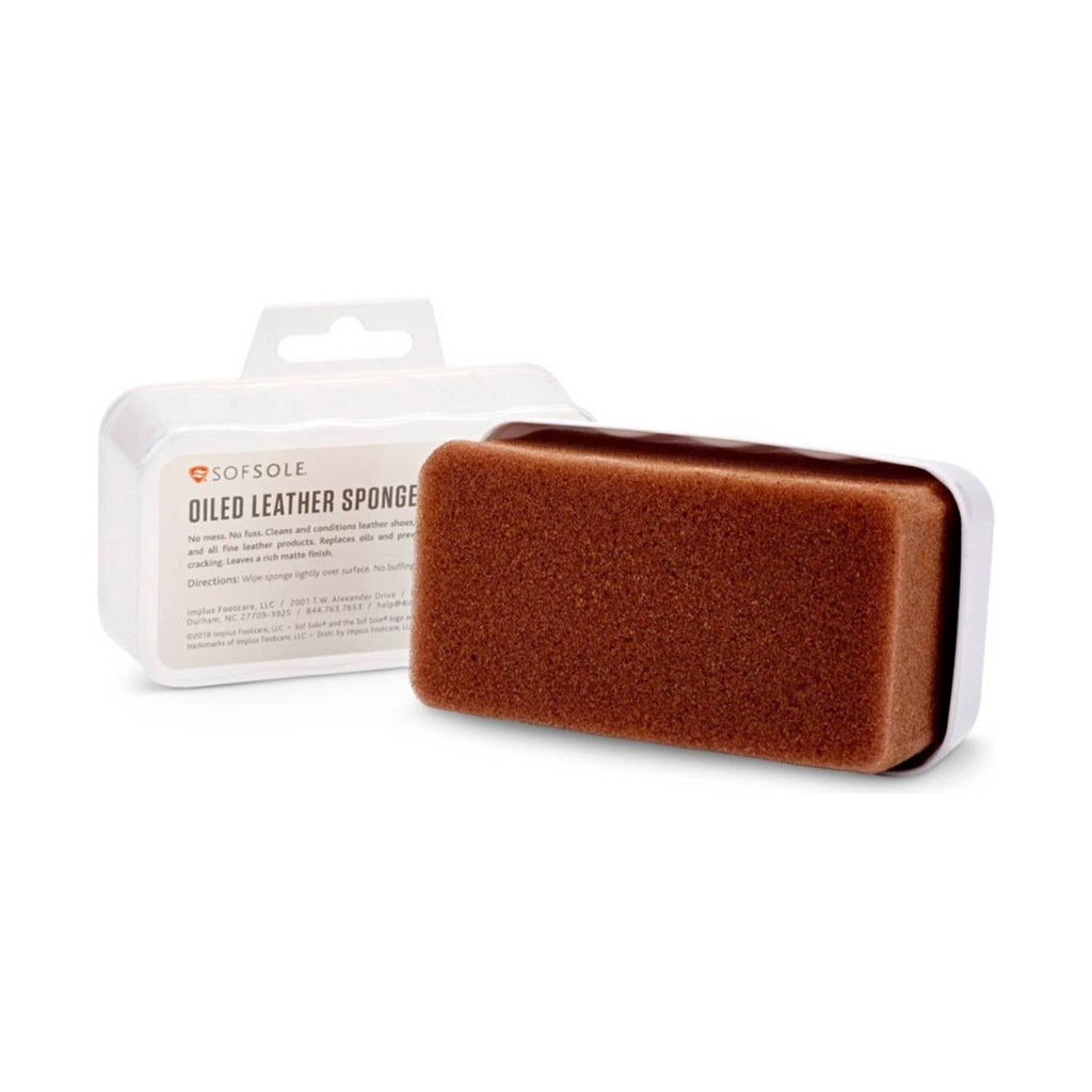 Brown leather sponge with packaging on a white background
