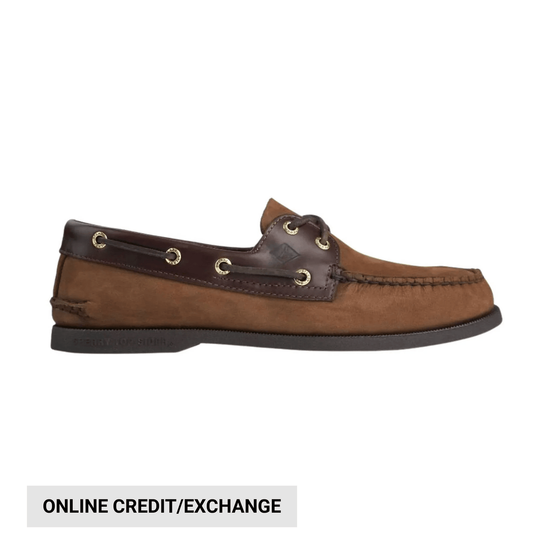 Brown leather boat shoe with dark collar, gold eyelets, and moc toe, shown in side view
