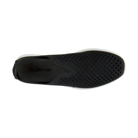 Black slip-on shoe with perforated upper and white sole, top view