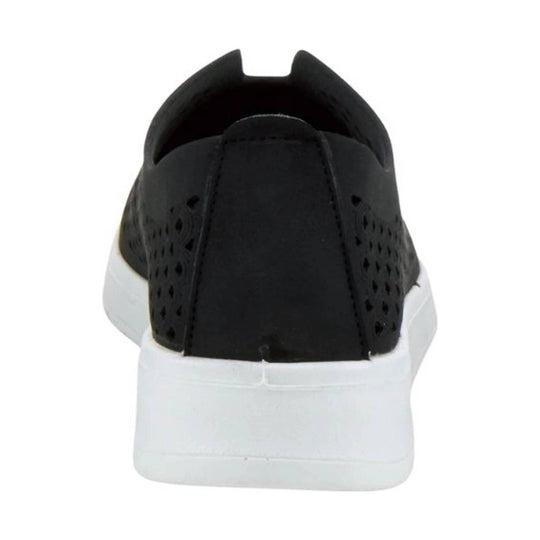Black slip-on sneaker viewed from the back with perforated side panels and a thick white sole
