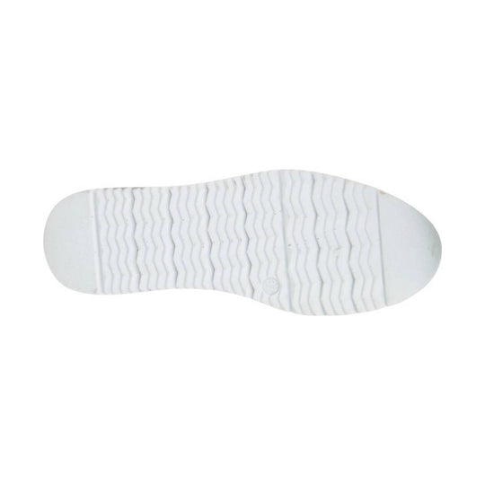 White shoe outsole with wavy tread pattern