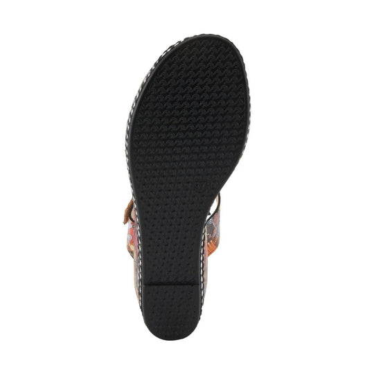 Black textured sole of a women's sandal, viewed from below