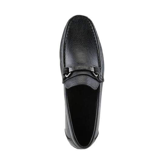 Black leather loafer with a textured upper, metal bit detail, and top-down view