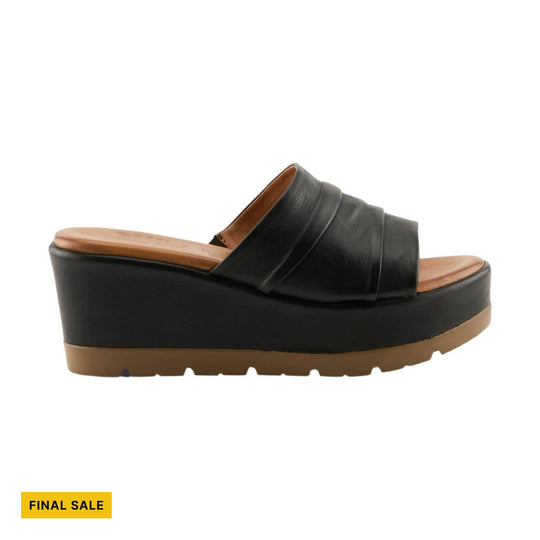 Black platform slide sandal with tan footbed and lug sole, with FINAL SALE text