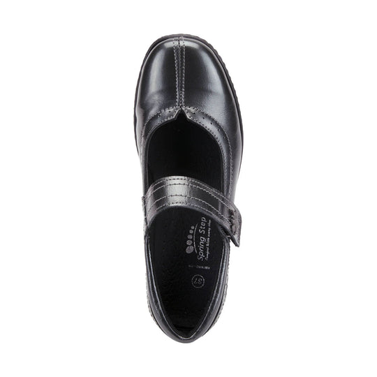 Black leather Mary Jane shoe with a wide strap and rounded toe, shown from above