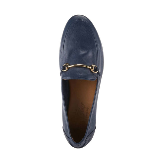 Navy leather loafer with a gold horsebit accent