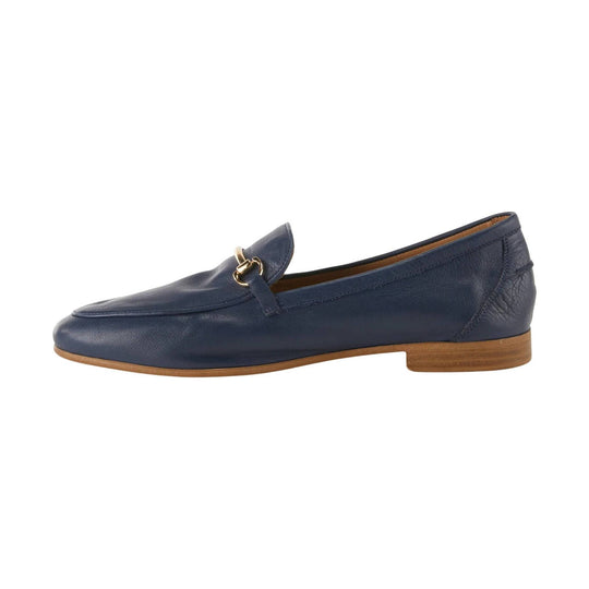 Navy leather loafer with gold horsebit detail and tan sole, shown in side profile