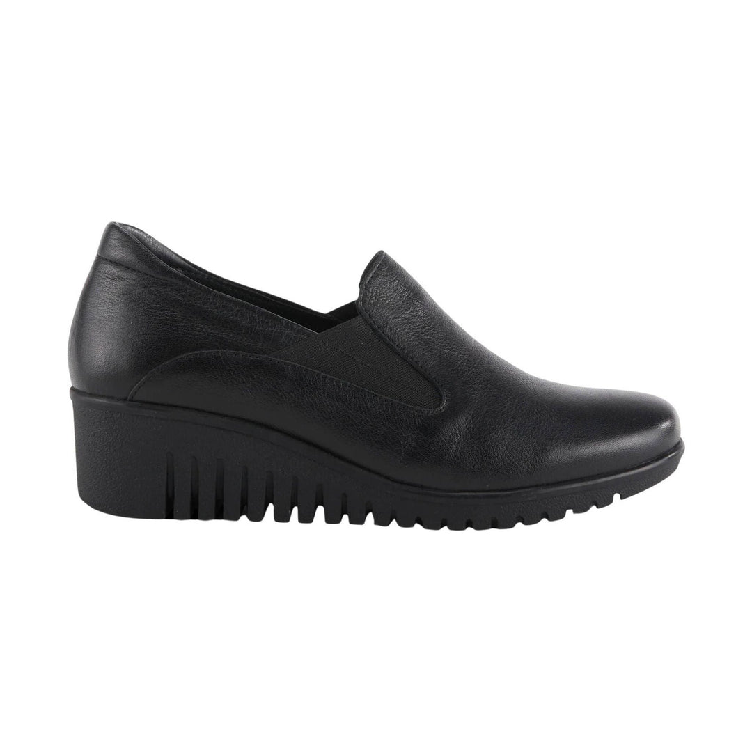Black slip-on wedge loafer with a textured leather upper and thick lug sole