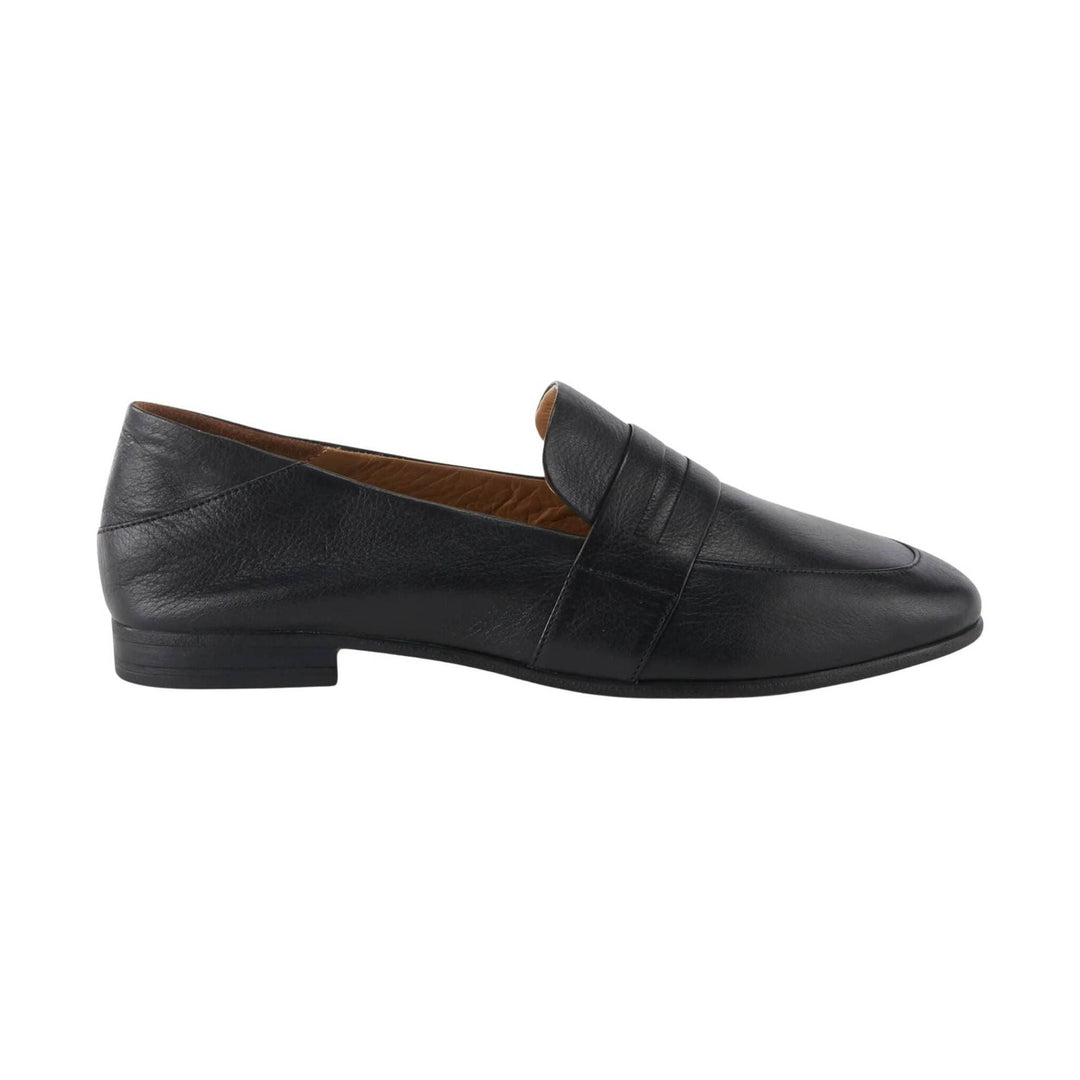 Black leather penny loafer shown in side profile on a white background