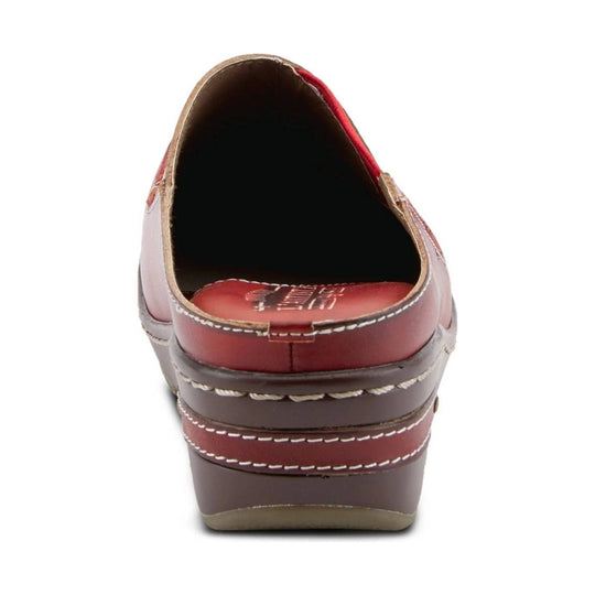 Back view of a red and brown wedge clog with white stitching and a closed heel.
