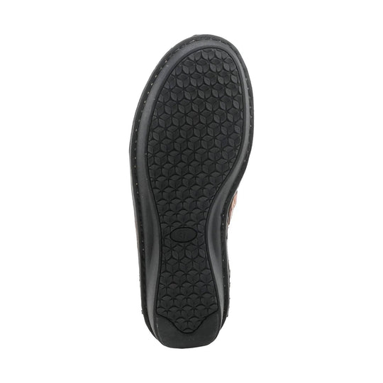 Black shoe sole with textured floral tread pattern