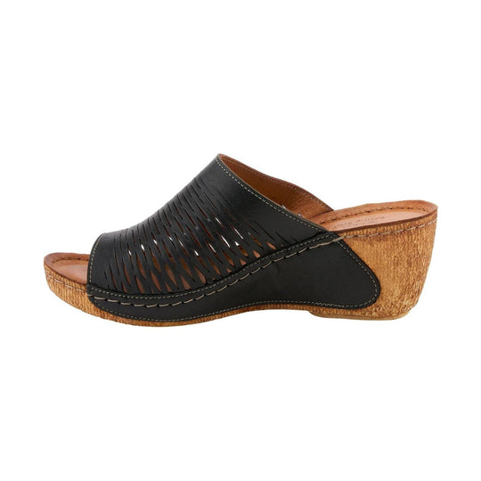 Black open-toe wedge sandal with cutout upper and cork-textured heel