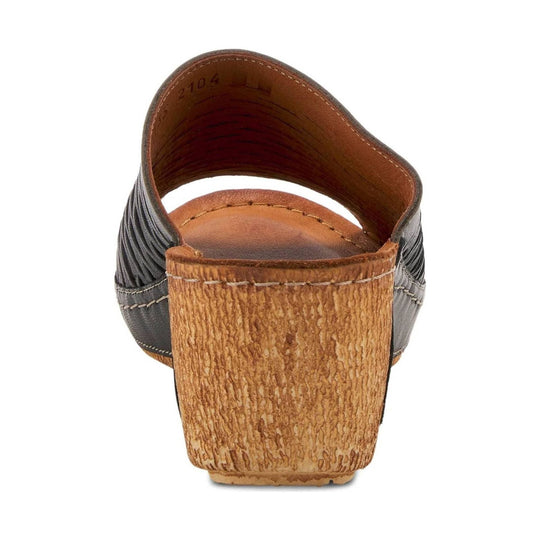 Black and brown open-back wedge sandal with a wood-look heel and ribbed side detailing