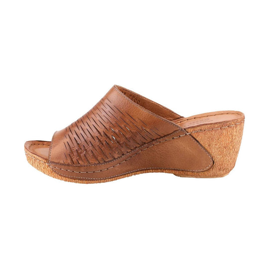 Brown leather wedge mule sandal with cutout upper and tan cork-look sole