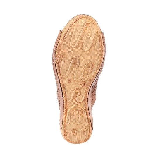 Tan sandal outsole with zigzag tread and side leather upper edges