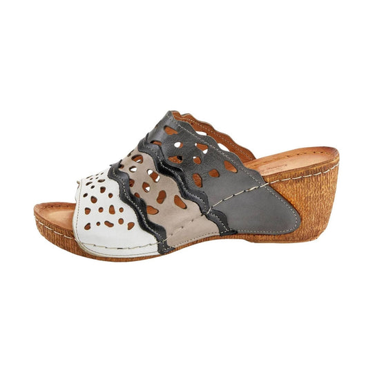 Cutout wedge sandal in white, taupe, and dark gray leather with cork-look heel and platform sole