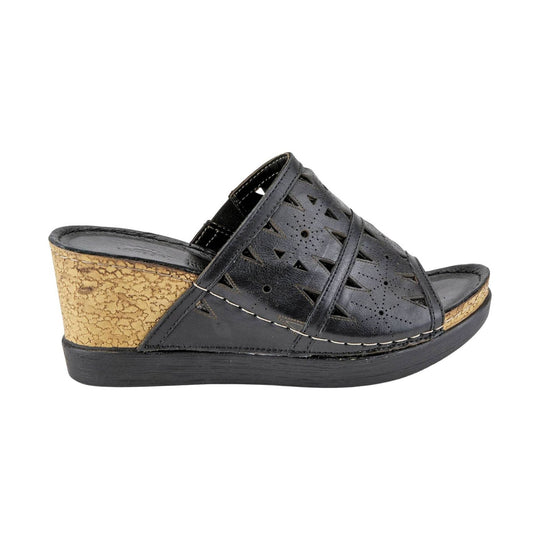 Black wedge sandal with cutout upper and cork-textured heel