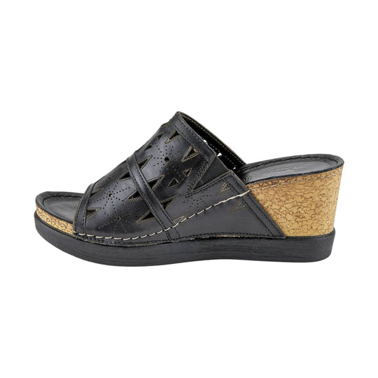 Black wedge sandal with cutout upper and cork-textured heel