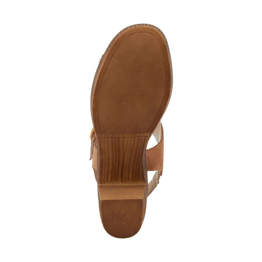 Tan suede sandal sole with a wood-look wedge heel