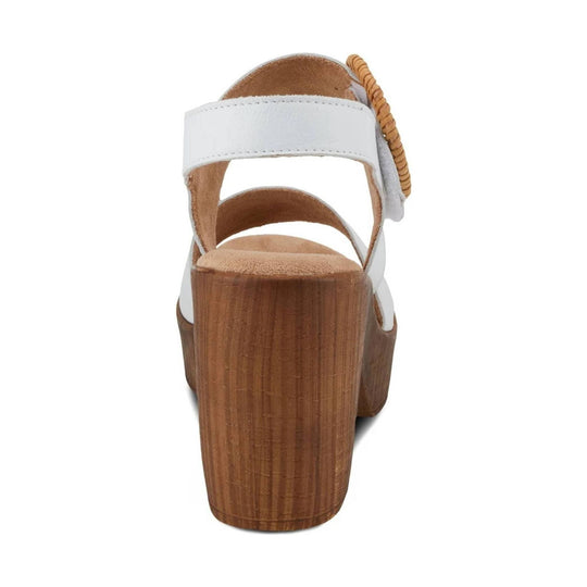 White platform wedge sandal with a wood-look heel and ankle strap, shown from the back