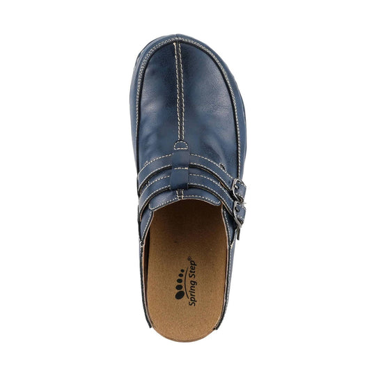Navy closed-toe clog with white stitching, buckle strap, and slip-on mule back