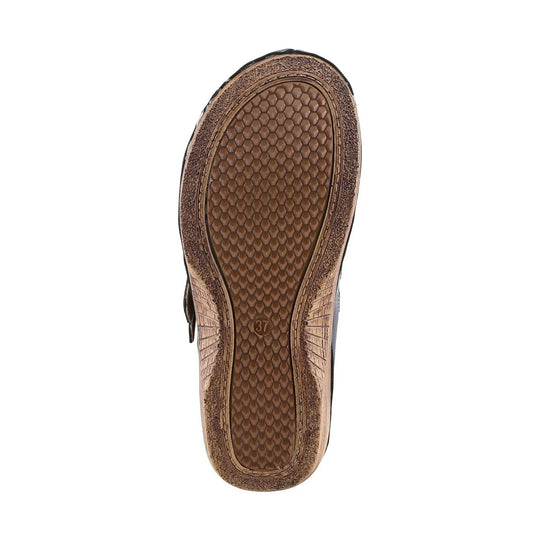 Brown shoe outsole with honeycomb tread and size 37 marking