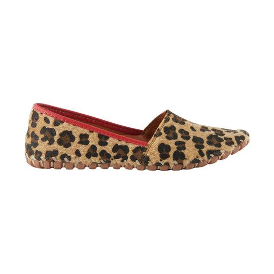 Leopard print flat shoe with red trim and tan treaded sole, side view