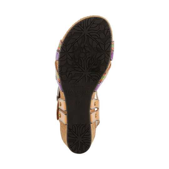 Black sandal sole with floral tread pattern and visible side straps