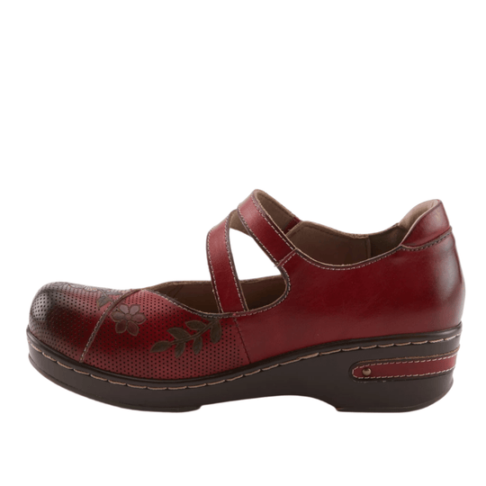 Red leather clog with perforated toe, floral embossing, crisscross straps, and a chunky dark wedge sole