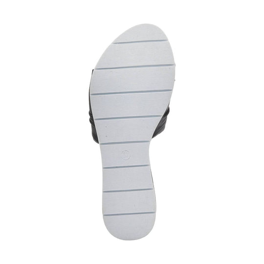 White outsole of a slide sandal with horizontal grooves and embossed size 37