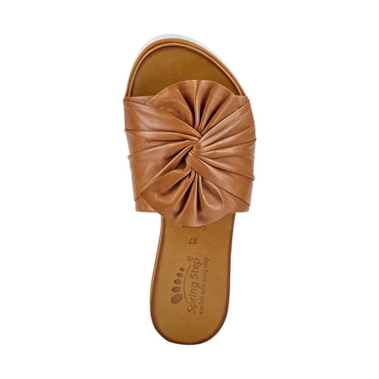 Tan leather slide sandal with gathered knot detail and cushioned footbed, top view