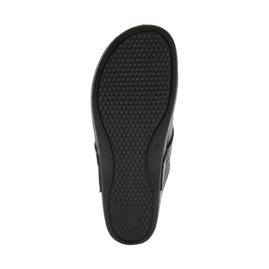 Black clog sole with textured tread and rounded toe