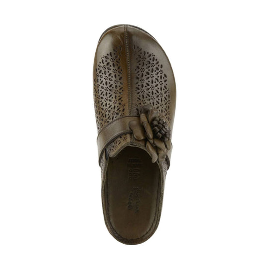 Brown leather clog with floral cutout pattern and a flower embellishment on the upper